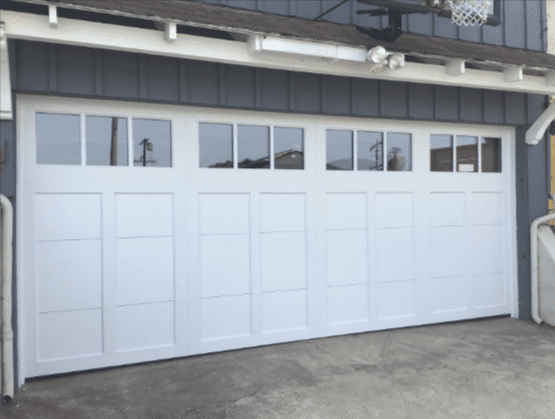 Expert Saugus garage door service for damaged door panels, where an Archway Garage Doors technician restores structural integrity and smooth track operation.